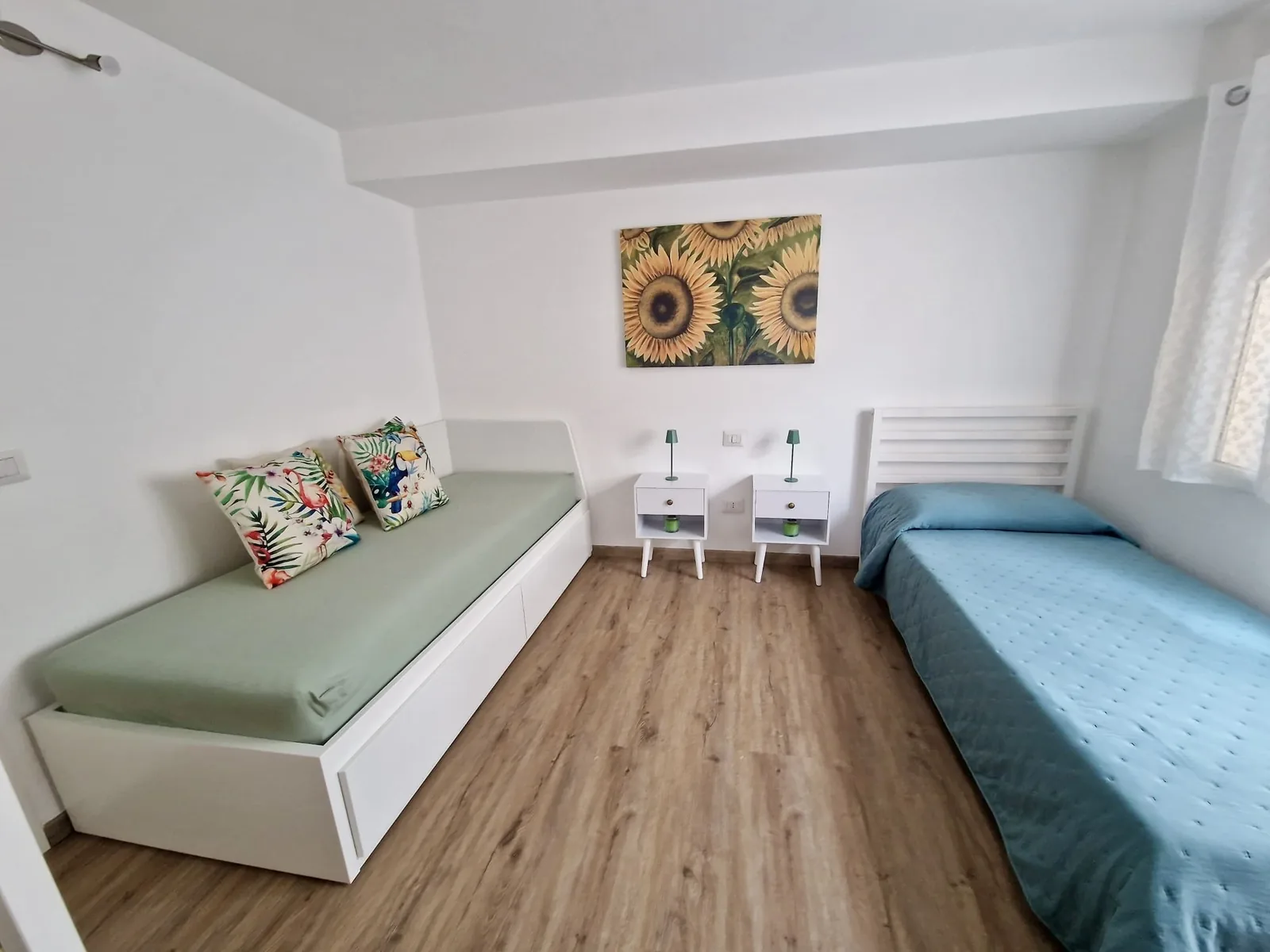 Second bedroom with two single beds