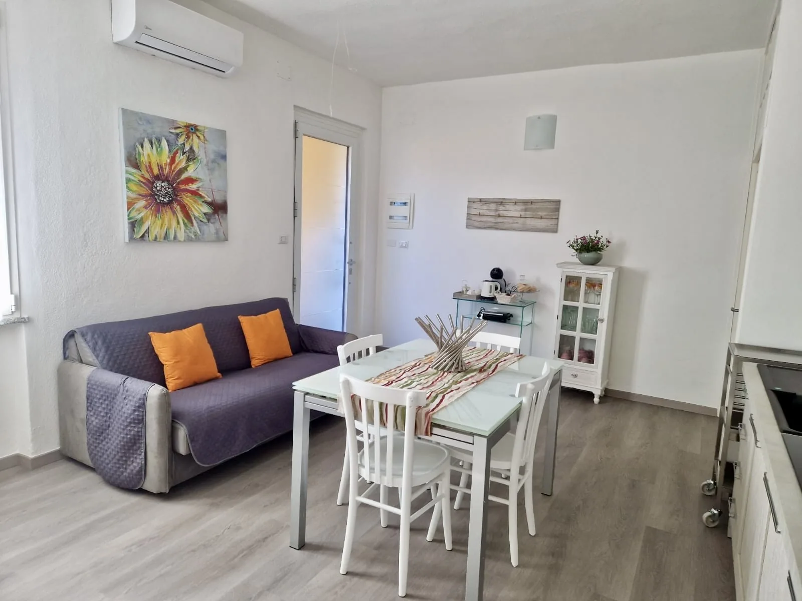 Bright living area with kitchen and dining table