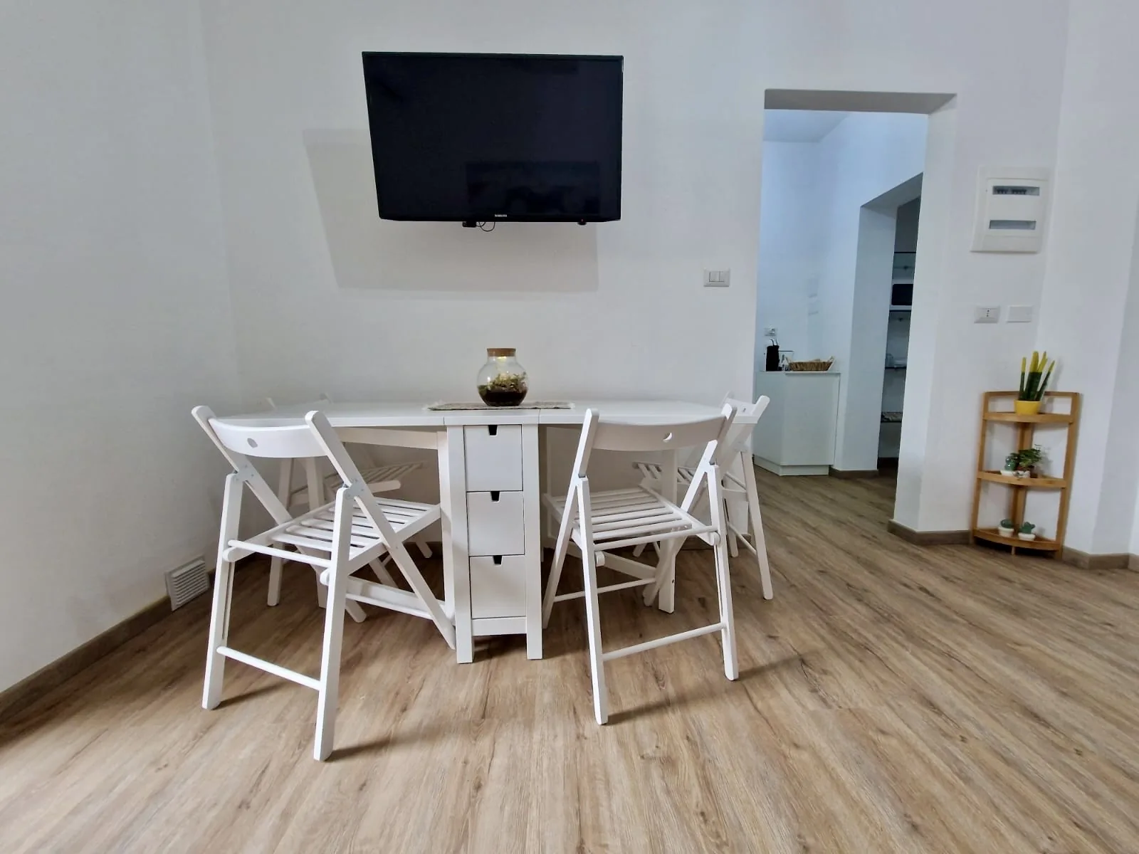 Indoor dining area with TV
